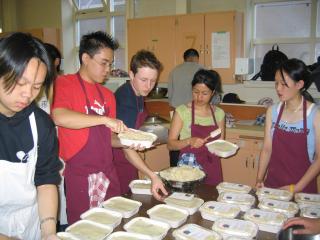 Students prepare '100 Meals for the Homeless' during Community Day